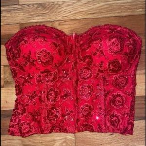 Red sequined corset